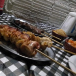 Junto E Misturado Espetinho E Caldo Comida