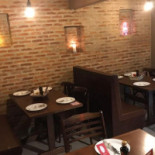Muzzarella Pizzaria Delivery À l'intérieur