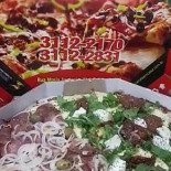 Pizzaria E Esfiharia Tá Em Casa Nourriture