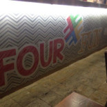É Logo Ali Extérieur