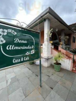 Dona Almerinda outside