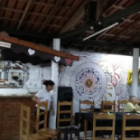 D. Danda Pizzaria À l'intérieur