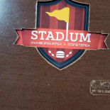 Stadium Hamburgueria E Espeteria Logo