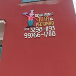 Tuta E Pedrinho Logo
